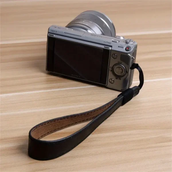 59be63351d8d437aa5f2f93433f0edfb-goods Faux Leather Wristband Camera Strap